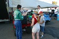 Here Will Nonnamaker signs the fan cards for some fans at Phoenix. 