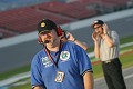 Bill Pate watches on in pit lane as Terry Borcheller (in the background) talks to his co-driver Forrest Barber on the radio. 