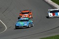 The #41 ORISON Planet Earth Motorsports Porsche with two Daytona Prototypes breathing down its neck. 