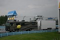The team's motorhome pulls in on a soggy unloading day. 