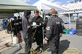 The crew prepares for a pitstop. 