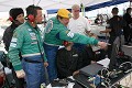 Will and Joe Nonnamaker watch the timing screen as the team works their way into the top 25 overall. 